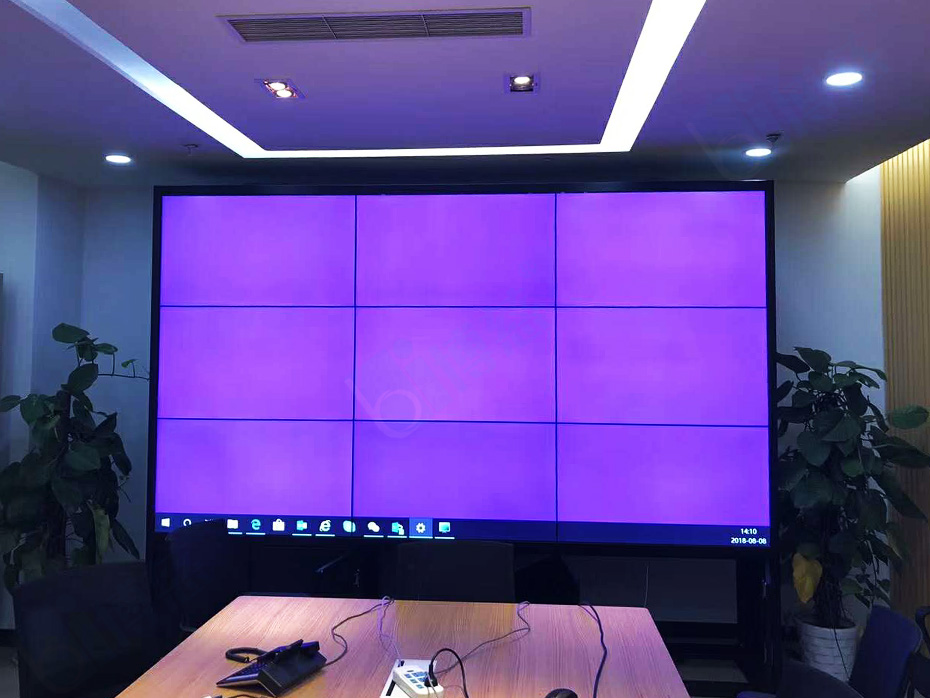 上海智能科技集团有限公司一套3×3拼接而成的智能化动态办公会议室系统平台